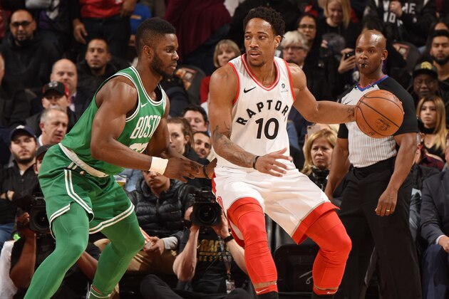 TORONTO, CANADA - APRIL 4: DeMar DeRozan #10 of the Toronto Raptors handles the ball against the Boston Celtics on April 4, 2018 at the Air Canada Centre in Toronto, Ontario, Canada.  NOTE TO USER: User expressly acknowledges and agrees that, by downloading and or using this Photograph, user is consenting to the terms and conditions of the Getty Images License Agreement.  Mandatory Copyright Notice: Copyright 2018 NBAE (Photo by Ron Turenne/NBAE via Getty Images)