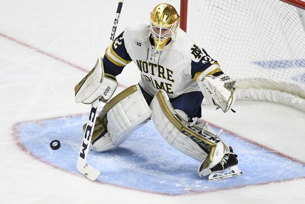 Notre Dame goaltender Cale Morris (32) during the first period of an NCAA college hockey regional tournament game, Friday, March 23, 2018, in Bridgeport, Conn. (AP Photo/Jessica Hill)