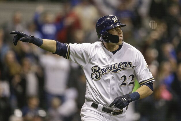 Milwaukee Brewers' Christian Yelich reacts to his game tying solo home run off of St. Louis Cardinals' Dominic Leon during the ninth inning of a baseball game Tuesday, April 3, 2018, in Milwaukee. (AP Photo/Tom Lynn)
