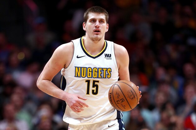 DENVER, CO - APRIL 03:  Nikola Jokic #15 of the Denver Nuggets brings the ball down the court against the Indiana Pacers at the Pepsi Center on April 3, 2018 in Denver, Colorado. NOTE TO USER: User expressly acknowledges and agrees that, by downloading and or using this photograph, User is consenting to the terms and conditions of the Getty Images License Agreement.  (Photo by Matthew Stockman/Getty Images)