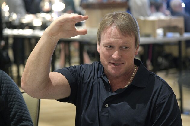 Oakland Raiders head football coach Jon Gruden answers a question from a reporter at the coaches breakfast during the NFL owners meetings, Tuesday, March 27, 2018 in Orlando, Fla. (Phelan M. Ebenhack/AP Images for NFL)