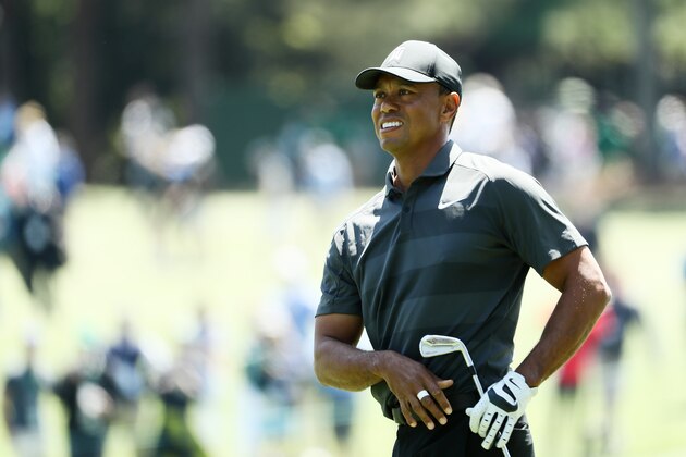 AUGUSTA, GA - APRIL 05:  Tiger Woods of the United States plays an approach shot on the eighth hole during the first round of the 2018 Masters Tournament at Augusta National Golf Club on April 5, 2018 in Augusta, Georgia.  (Photo by Jamie Squire/Getty Images)