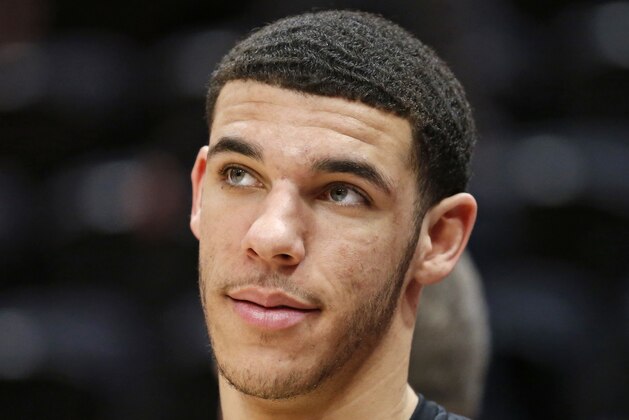 Los Angeles Lakers guard Lonzo Ball watches practice before the start of their NBA basketball game against the Utah Jazz Tuesday, April 3, 2018, in Salt Lake City. (AP Photo/Rick Bowmer)