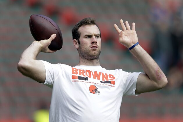Cleveland Browns quarterback Kevin Hogan (8) passes the ball as he warms-up before an NFL football game against Minnesota Vikings at Twickenham Stadium in London, Sunday Oct. 29, 2017. (AP Photo/Tim Ireland)