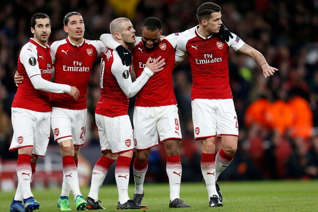 Arsenal's French striker Alexandre Lacazette (2nd R) celebrates with (L-R) Arsenal's Armenian midfielder Henrikh Mkhitaryan, Arsenal's Spanish defender Hector Bellerin, Arsenal's English midfielder Jack Wilshere and Arsenal's Swiss midfielder Granit Xhaka after scoring their fourth goal during the UEFA Europa League first leg quarter-final football match  between Arsenal and CSKA Moscow at the Emirates Stadium in London on April 5, 2018.  / AFP PHOTO / IKIMAGES / Ian KINGTON        (Photo credit should read IAN KINGTON/AFP/Getty Images)