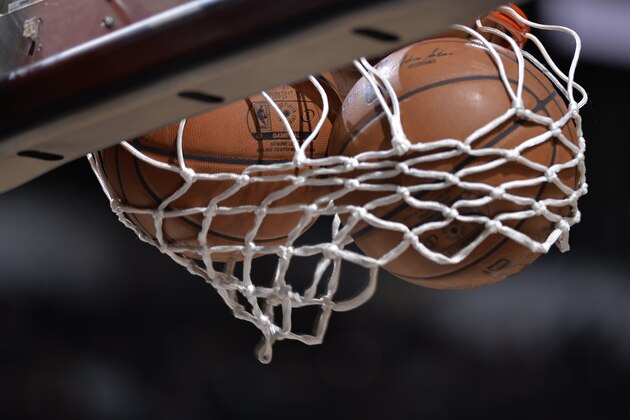 SAN ANTONIO, TX - MARCH 19: A generic view of two basketballs in the net before the game between the Golden State Warriors and the San Antonio Spurs on March 19, 2018 at the AT&T Center in San Antonio, Texas. NOTE TO USER: User expressly acknowledges and agrees that, by downloading and or using this photograph, user is consenting to the terms and conditions of the Getty Images License Agreement. Mandatory Copyright Notice: Copyright 2018 NBAE (Photos by Mark Sobhani/NBAE via Getty Images)