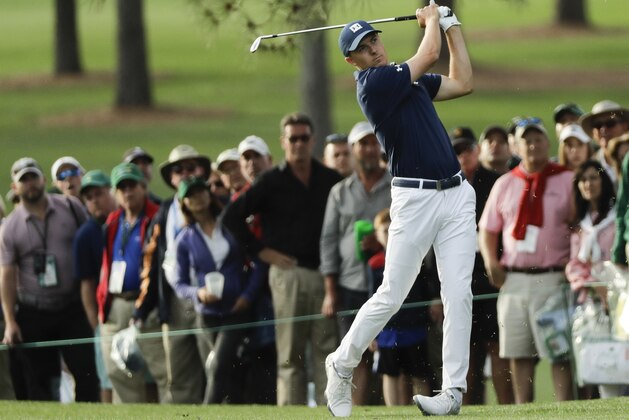 Jordan Spieth hits a shot on the 17th hole during the first round at the Masters golf tournament Thursday, April 5, 2018, in Augusta, Ga. (AP Photo/David J. Phillip)
