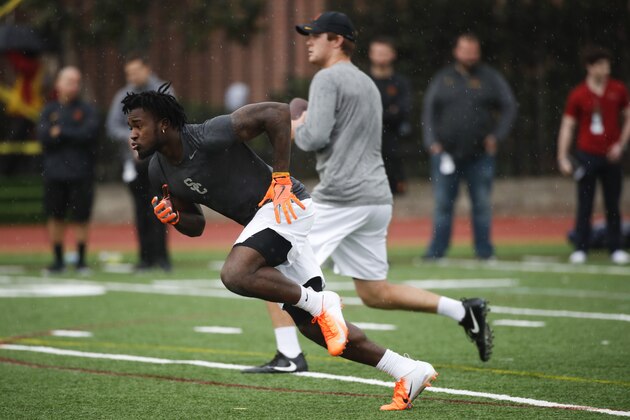 Southern California running back Ronald Jones and quarterback Sam Darnold participate in USC Pro Day, Wednesday, March 21, 2018, in Los Angeles. The Pro Day is intended to showcase talent to NFL scouts for the upcoming draft. (AP Photo/Jae C. Hong)