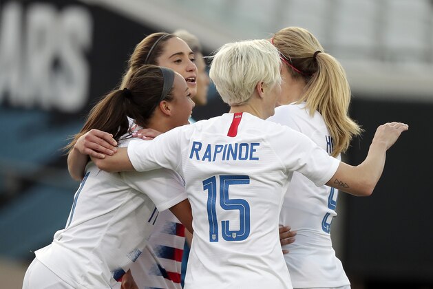 United States players, including Megan Rapinoe (15), celebrate with Mallory Pugh, left, after she scored a goal against the Mexico during the first half of an international friendly soccer match Thursday, April 5, 2018, in Jacksonville, Fla. (AP Photo/John Raoux)