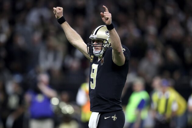 NEW ORLEANS, LA - JANUARY 07:  Drew Brees #9 of the New Orleans Saints reacts after throwing a touchdown pass against the Carolina Panthers at the Mercedes-Benz Superdome on January 7, 2018 in New Orleans, Louisiana.  (Photo by Chris Graythen/Getty Images)