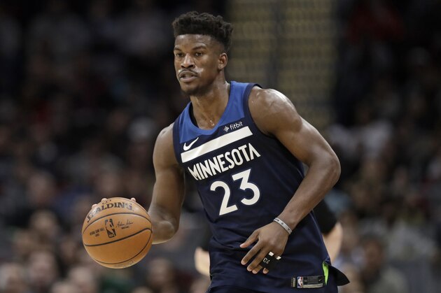 Minnesota Timberwolves' Jimmy Butler drives against the Cleveland Cavaliers in the second half of an NBA basketball game, Wednesday, Feb. 7, 2018, in Cleveland. (AP Photo/Tony Dejak)