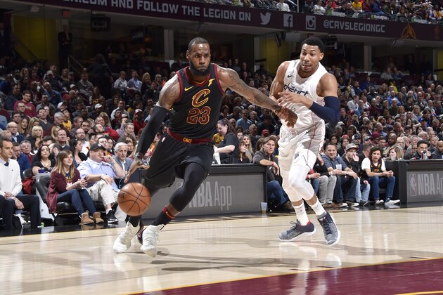 CLEVELAND, OH - APRIL 5: LeBron James #23 of the Cleveland Cavaliers handles the ball against the Washington Wizards on April 5, 2018 at The Quicken Loans Arena in Cleveland, Ohio. NOTE TO USER: User expressly acknowledges and agrees that, by downloading and/or using this Photograph, user is consenting to the terms and conditions of the Getty Images License Agreement. Mandatory Copyright Notice: Copyright 2018 NBAE (Photo by David Liam Kyle/NBAE via Getty Images)