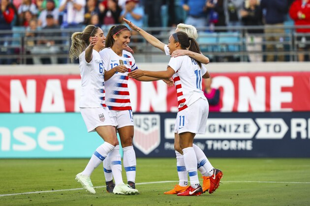 JACKSONVILLE, FL - APRIL 5: Mallory Pugh #11 of United States celebrates after scoring a goal with her teammates in the first half against Mexico at Everbank Field on April 5, 2018 in Jacksonville, Florida. (Photo by Logan Bowles/Getty Images)