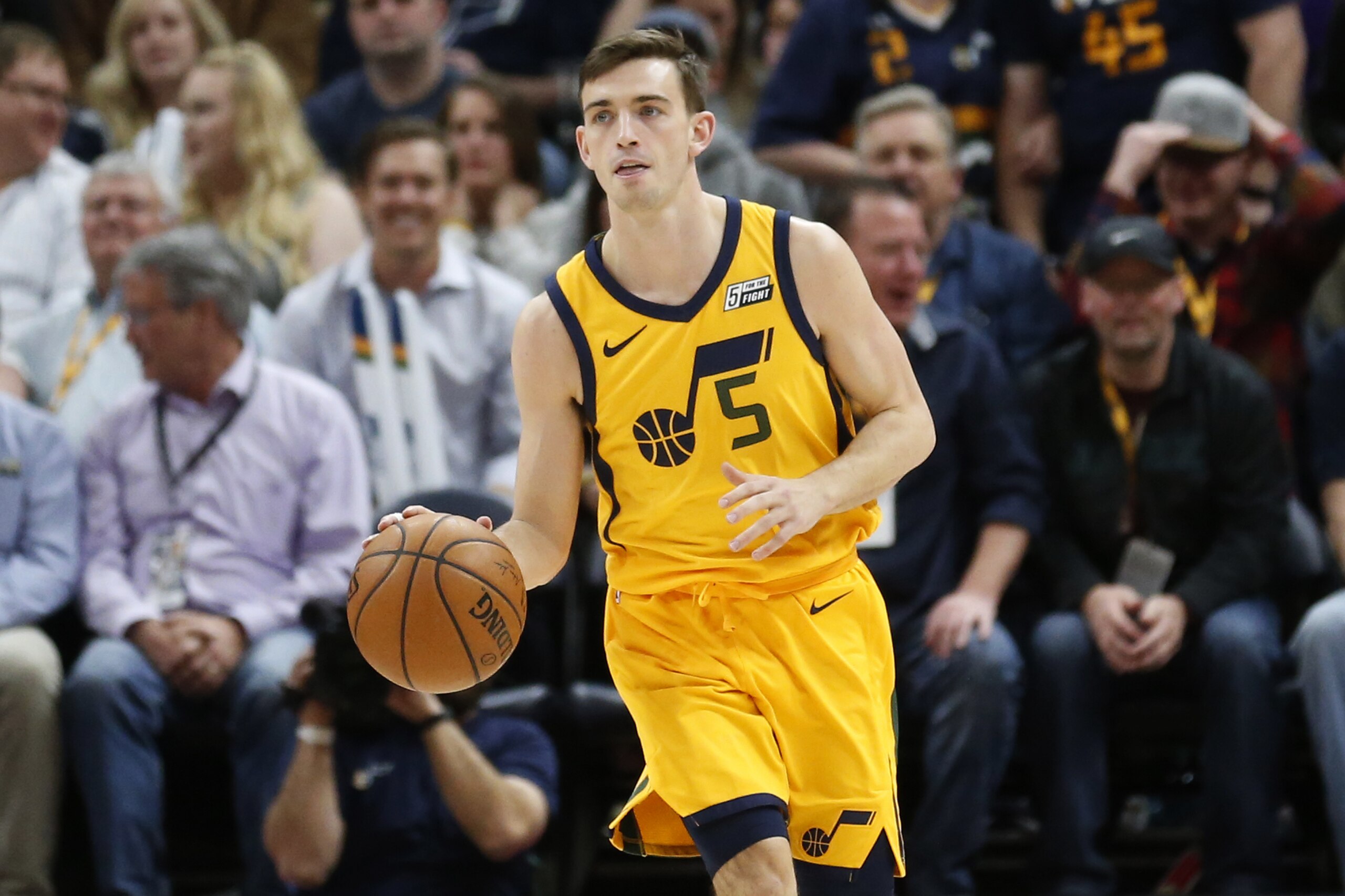 Utah Jazz guard David Stockton (5) brings the ball up court in the second half during an NBA basketball game against the Los Angeles Clippers Thursday, April 5, 2018, in Salt Lake City. (AP Photo/Rick Bowmer)