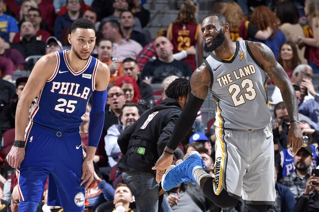 CLEVELAND, OH - MARCH 1:  LeBron James #23 of the Cleveland Cavaliers and Ben Simmons #25 of the Philadelphia 76ers talk during the game on March 1, 2018 at Quicken Loans Arena in Cleveland, Ohio. NOTE TO USER: User expressly acknowledges and agrees that, by downloading and/or using this Photograph, user is consenting to the terms and conditions of the Getty Images License Agreement. Mandatory Copyright Notice: Copyright 2018 NBAE (Photo by David Liam Kyle/NBAE via Getty Images)