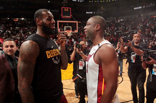 MIAMI, FL - MARCH 27:  LeBron James #23 of the Cleveland Cavaliers and Dwyane Wade #3 of the Miami Heat meet after the game between the two teams on March 27, 2018 at American Airlines Arena in Miami, Florida. NOTE TO USER: User expressly acknowledges and agrees that, by downloading and or using this Photograph, user is consenting to the terms and conditions of the Getty Images License Agreement. Mandatory Copyright Notice: Copyright 2018 NBAE (Photo by Oscar Baldizon/NBAE via Getty Images)