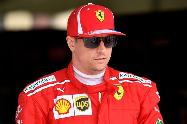 Ferrari's Finnish driver Kimi Raikkonen walks down the pit lane during the first practice session on April 6, 2018, ahead of the Bahrain Formula One Grand Prix at the Bahrain International Circuit in Sakhir / AFP PHOTO / ANDREJ ISAKOVIC        (Photo credit should read ANDREJ ISAKOVIC/AFP/Getty Images)