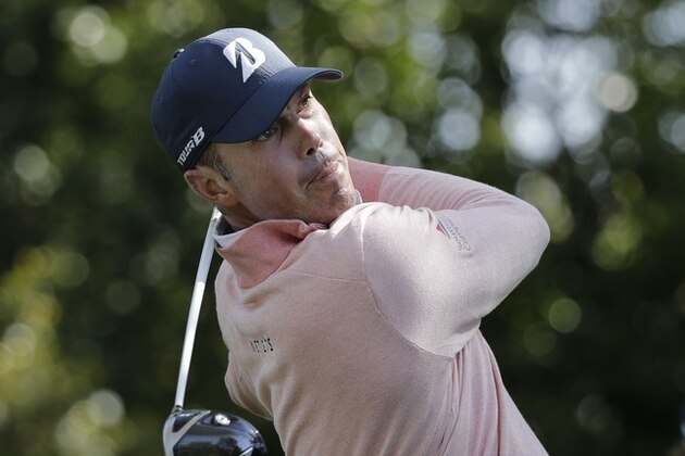 Matt Kuchar hits a drive on the second hole during the second round at the Masters golf tournament Friday, April 6, 2018, in Augusta, Ga. (AP Photo/David J. Phillip)