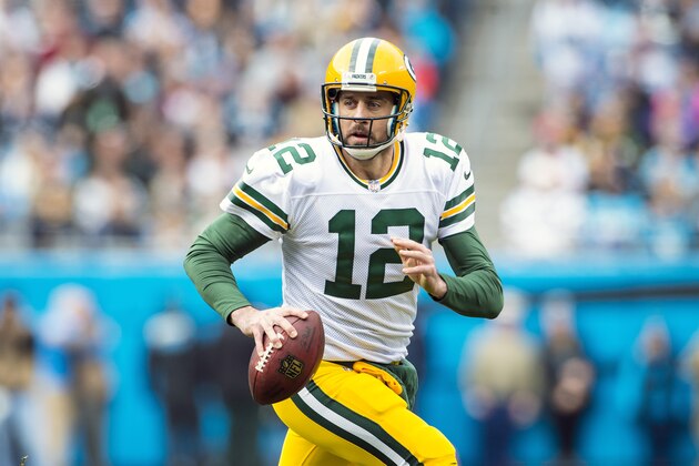 CHARLOTTE, NC - DECEMBER 17:  Aaron Rodgers #12 of the Green Bay Packers looks for a receiver against the Carolina Panthers during a NFL game at Bank of America Stadium on December 17, 2017 in Charlotte, North Carolina.  (Photo by Ronald C. Modra/Sports Imagery/Getty Images)