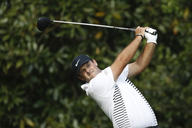 Patrick Reed hits a drive at the 11th hole during the second round at the Masters golf tournament Friday, April 6, 2018, in Augusta, Ga. (AP Photo/Charlie Riedel)