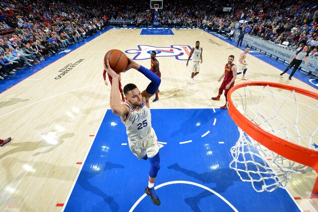 PHILADELPHIA, PA - APRIL 6:  Ben Simmons #25 of the Philadelphia 76ers dunks the ball during the game against the Cleveland Cavaliers on April 6, 2018 in Philadelphia, Pennsylvania NOTE TO USER: User expressly acknowledges and agrees that, by downloading and/or using this Photograph, user is consenting to the terms and conditions of the Getty Images License Agreement. Mandatory Copyright Notice: Copyright 2018 NBAE (Photo by Jesse D. Garrabrant/NBAE via Getty Images)
