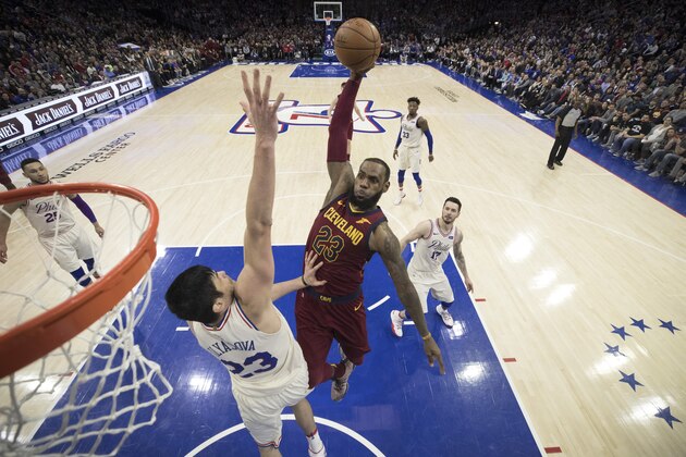 PHILADELPHIA, PA - APRIL 6: LeBron James #23 of the Cleveland Cavaliers dunks the ball over Ersan Ilyasova #23 of the Philadelphia 76ers in the fourth quarter at the Wells Fargo Center on April 6, 2018 in Philadelphia, Pennsylvania. The 76ers defeated the Cavaliers 132-130. NOTE TO USER: User expressly acknowledges and agrees that, by downloading and or using this photograph, User is consenting to the terms and conditions of the Getty Images License Agreement. (Photo by Mitchell Leff/Getty Images)