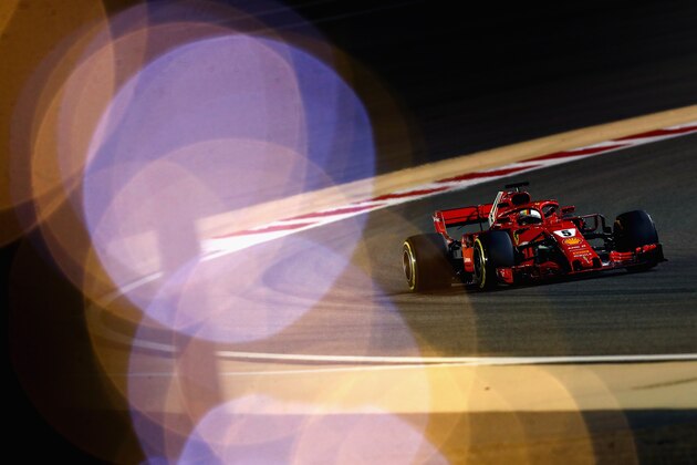 BAHRAIN, BAHRAIN - APRIL 06: Sebastian Vettel of Germany driving the (5) Scuderia Ferrari SF71H on track during practice for the Bahrain Formula One Grand Prix at Bahrain International Circuit on April 6, 2018 in Bahrain, Bahrain. (Photo by Mark Thompson/Getty Images) BAHRAIN, BAHRAIN - APRIL 06: Sebastian Vettel of Germany driving the (5) Scuderia Ferrari SF71H on track during practice for the Bahrain Formula One Grand Prix at Bahrain International Circuit on April 6, 2018 in Bahrain, Bahrain. (Photo by Mark Thompson/Getty Images)