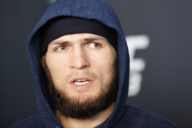 UFC lightweight fighter Khabib Nurmagomedov talks to reporters during UFC223's media day, Thursday, April 5, 2018, in New York. Nurmagomedov's opponent in Saturday's UFC lightweight title fight will be UFC's current featherweight champion Max Holloway after Tony Ferguson, the sport's interim lightweight champion, pulled out on short notice due an apparent knee injury. (AP Photo/Kathy Willens)