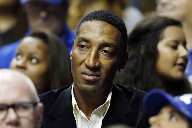 FILE - In this March 13, 2015, file photo, former NBA player Scottie Pippen watches the first half of an NCAA college basketball game in the quarter final round of the Southeastern Conference tournament between Kentucky and Florida, in Nashville, Tenn. A lawsuit has been dropped that alleged former Chicago Bulls star assaulted a man at a sushi restaurant in 2013. Pippen's attorney, Mark Geragos, said Saturday, Oct. 10, 2015, that a countersuit Pippen filed against Camran Shafighi is also being dropped. (AP Photo/Steve Helber, File)