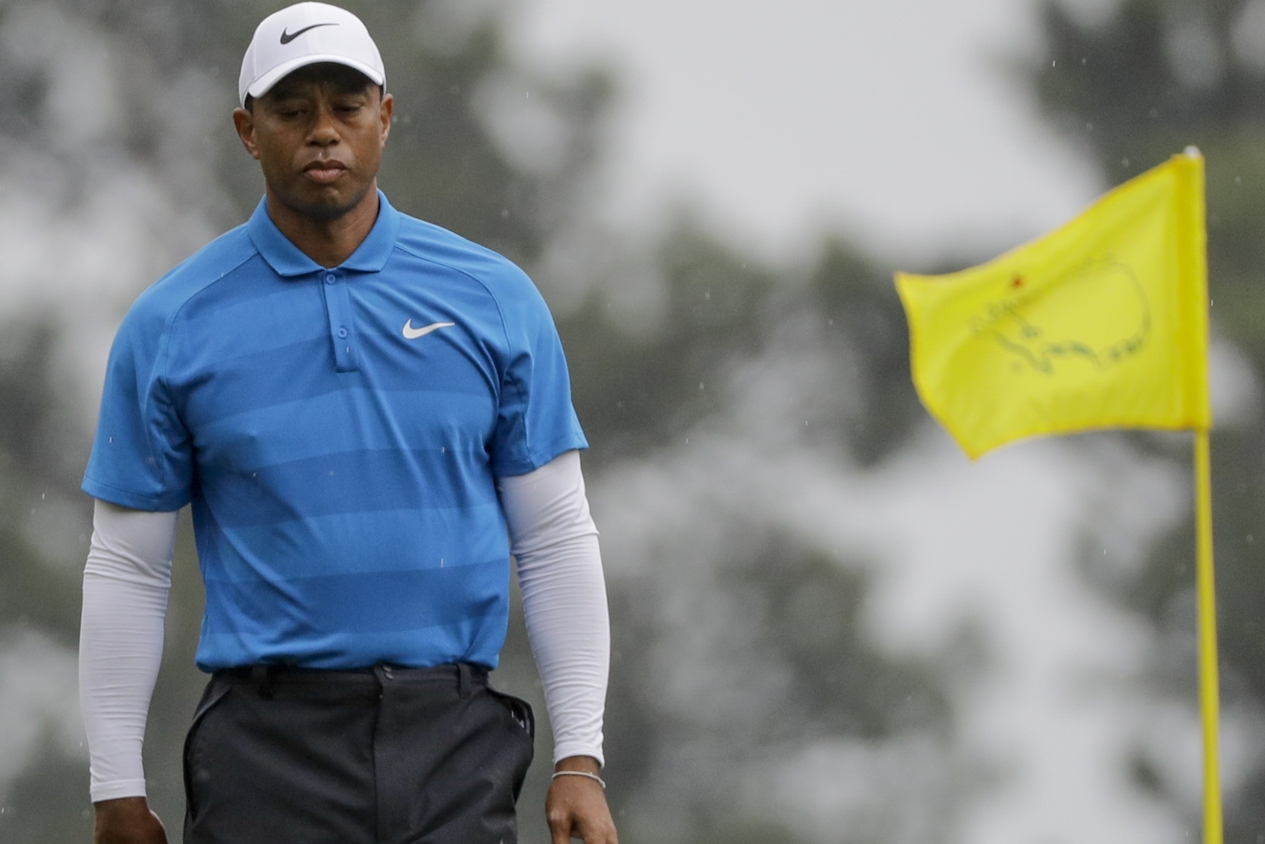Tiger Woods walks off the third green during the third round at the Masters golf tournament Saturday, April 7, 2018, in Augusta, Ga. (AP Photo/David J. Phillip)