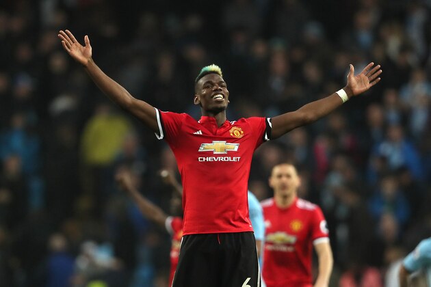 MANCHESTER, ENGLAND - APRIL 07:  Paul Pogba of Manchester United celebrates at the end of the Premier League match between Manchester City and Manchester United at Etihad Stadium on April 7, 2018 in Manchester, England. (Photo by Matthew Ashton - AMA/Getty Images)