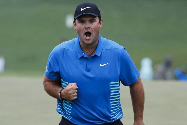 Patrick Reed reacts after making a birdie putt on the ninth hole during the third round at the Masters golf tournament Saturday, April 7, 2018, in Augusta, Ga. (AP Photo/David Goldman)