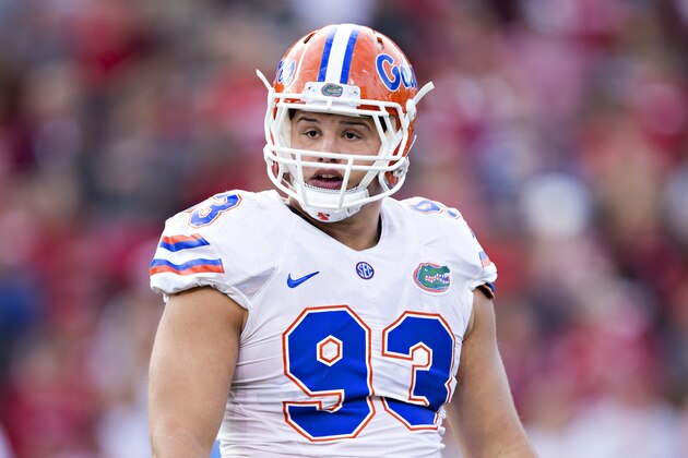 FAYETTEVILLE, AR - NOVEMBER 5:  Taven Bryan #93 of the Florida Gators looks to the sidelines during a game against the Arkansas Razorbacks at Razorback Stadium on November 5, 2016 in Fayetteville, Arkansas.  The Razorbacks defeated the Gators 31-10.  (Photo by Wesley Hitt/Getty Images)