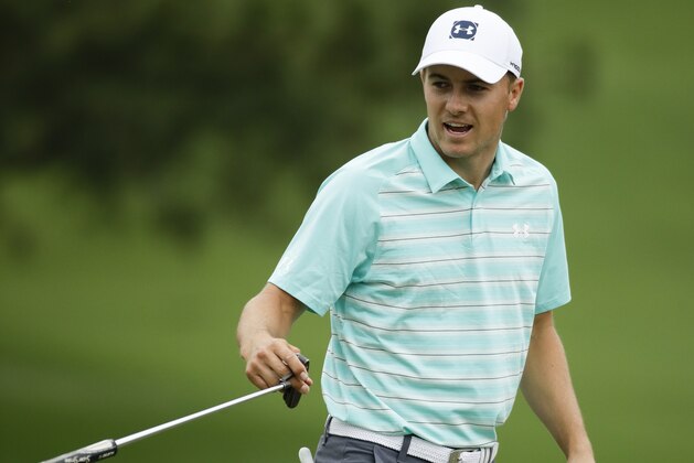 Jordan Spieth smiles after his birdie on the seventh hole during the third round at the Masters golf tournament Saturday, April 7, 2018, in Augusta, Ga. (AP Photo/Chris Carlson)
