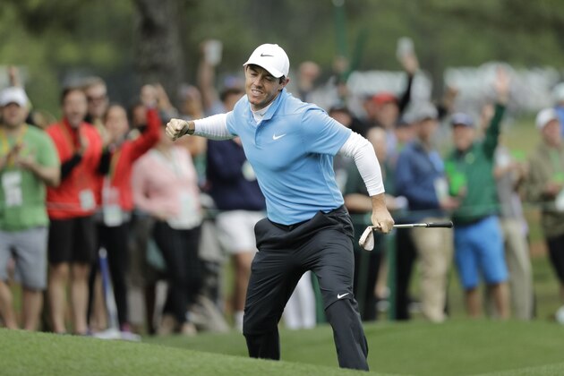 Rory McIlroy, of Northern Ireland, reacts after his eagle on the eighth hole during the third round at the Masters golf tournament Saturday, April 7, 2018, in Augusta, Ga. (AP Photo/David J. Phillip)