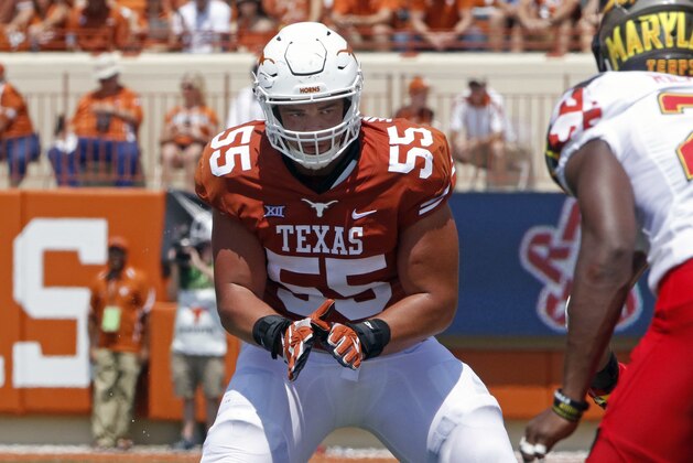 Texas offensive lineman Connor Williams (55) looks to block during the second half of an NCAA college football game against Maryland, Saturday, Sept. 2, 2017, in Austin, Texas. (AP Photo/Michael Thomas)