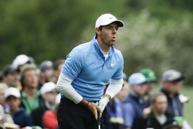 Rory McIlroy, of Northern Ireland, watches his shot on the 12th hole during the third round at the Masters golf tournament Saturday, April 7, 2018, in Augusta, Ga. (AP Photo/Chris Carlson)