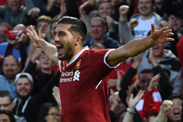 Liverpool's German midfielder Emre Can celebrates scoring the team's first goal during the Champions League qualifier, second leg match between Liverpool and Hoffenheim at Anfield stadium in Liverpool on August 23, 2017. / AFP PHOTO / Oli SCARFF        (Photo credit should read OLI SCARFF/AFP/Getty Images)