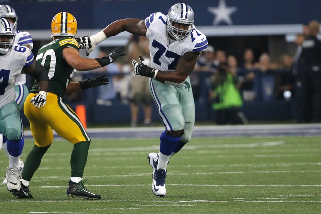 Dallas Cowboys offensive tackle Tyron Smith (77) faces off against Green Bay Packers linebacker Blake Martinez (50) during an NFL football game, Sunday, Oct. 8, 2017, in Arlington, Texas. (AP Photo/Roger Steinman)