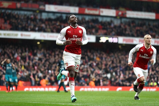 LONDON, ENGLAND - APRIL 08:  Danny Welbeck of Arsenal celebrates with team mate Jack Wilshere after scoring his sides third goal during the Premier League match between Arsenal and Southampton at Emirates Stadium on April 8, 2018 in London, England.  (Photo by Bryn Lennon/Getty Images)