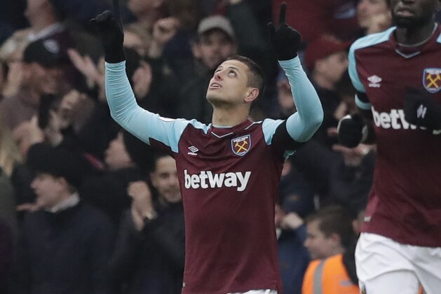 West Hams's Javier Hernandez celebrates after scoring goal during the English Premier League soccer match between Chelsea and West Ham United at Stamford Bridge stadium in London, Sunday, April 8, 2018. (AP Photo/Matt Dunham)
