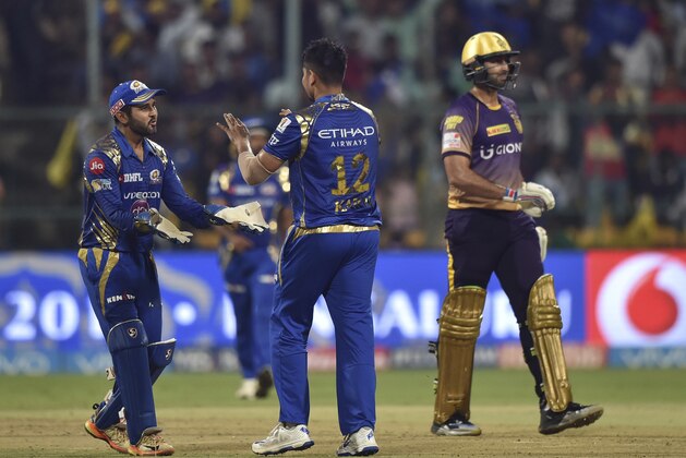 Mumbai Indians Karn Sharma, centre, celebrates with wicket keeper Parthiv Patel, left, the wicket of Colin De Grandhomme of Kolkata Knight Riders during the Indian Premier League cricket eliminator match in Bangalore, India, Friday, May 19, 2017. (AP Photo) Mumbai Indians Karn Sharma, centre, celebrates with wicket keeper Parthiv Patel, left, the wicket of Colin De Grandhomme of Kolkata Knight Riders during the Indian Premier League cricket eliminator match in Bangalore, India, Friday, May 19, 2017. (AP Photo)