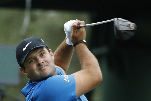 Patrick Reed hits a drive on the 18th hole during the third round at the Masters golf tournament Saturday, April 7, 2018, in Augusta, Ga. (AP Photo/Charlie Riedel)