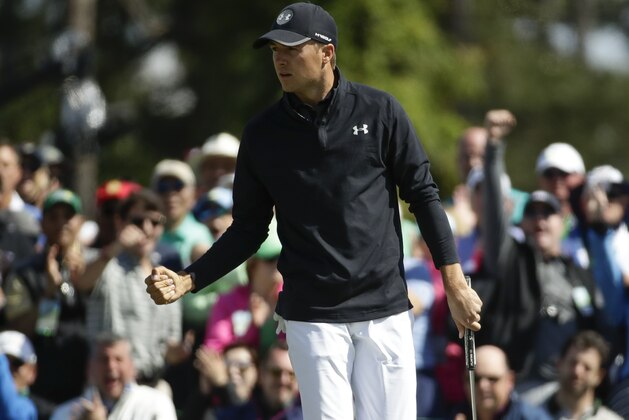 Jordan Spieth reacts to his birdie on the ninth hole during the fourth round at the Masters golf tournament Sunday, April 8, 2018, in Augusta, Ga. (AP Photo/Chris Carlson)
