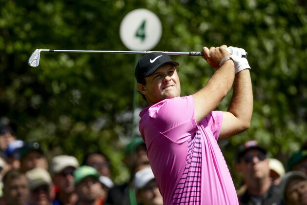 Patrick Reed hits on the fourth tee during the fourth round at the Masters golf tournament Sunday, April 8, 2018, in Augusta, Ga. (AP Photo/Chris Carlson)