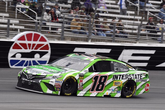 Kyle Busch (18) comes out of Turn 4 during a NASCAR Cup Series auto race in Fort Worth, Texas, Sunday, April 8, 2018. (AP Photo/Larry Papke)