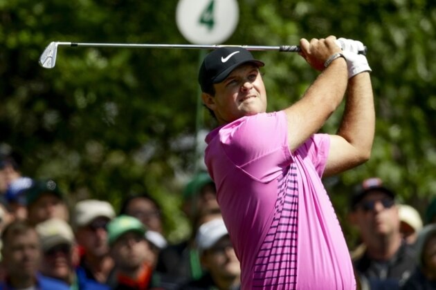 Patrick Reed hits on the fourth tee during the fourth round at the Masters golf tournament Sunday, April 8, 2018, in Augusta, Ga. (AP Photo/Chris Carlson)