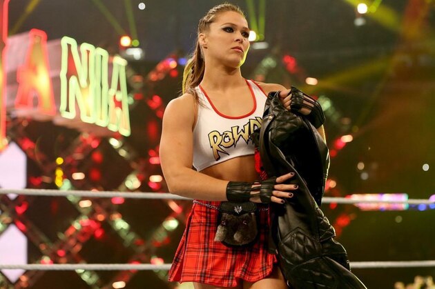 LAS VEGAS, NV - SEPTEMBER 12:  (L-R) WWE Chief Brand Officer Stephanie McMahon, MMA fighter Ronda Rousey and WWE Executive Vice President of Talent, Live Events and Creative Paul 'Triple H' Levesque appear on the red carpet of the WWE Mae Young Classic on September 12, 2017 in Las Vegas, Nevada.  (Photo by Bryan Steffy/Getty Images for WWE)