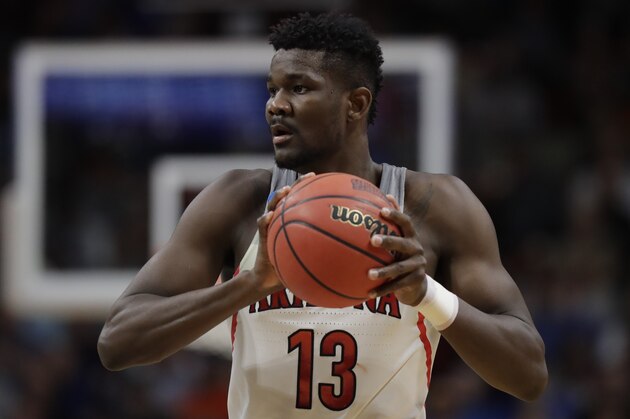 Arizona forward Deandre Ayton holds the ball against Buffalo during the first half of a first-round game in the NCAA men's college basketball tournament Thursday, March 15, 2018, in Boise, Idaho. (AP Photo/Ted S. Warren)