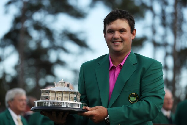 AUGUSTA, GA - APRIL 08:  Patrick Reed of the United States celebrates with the trophy during the green jacket ceremony after winning the 2018 Masters Tournament at Augusta National Golf Club on April 8, 2018 in Augusta, Georgia.  (Photo by Patrick Smith/Getty Images)